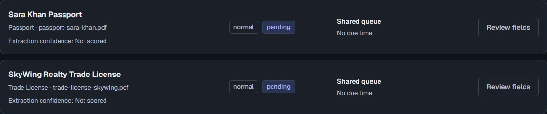 Two synthetic documents waiting for review, with source filenames, pending states and review actions