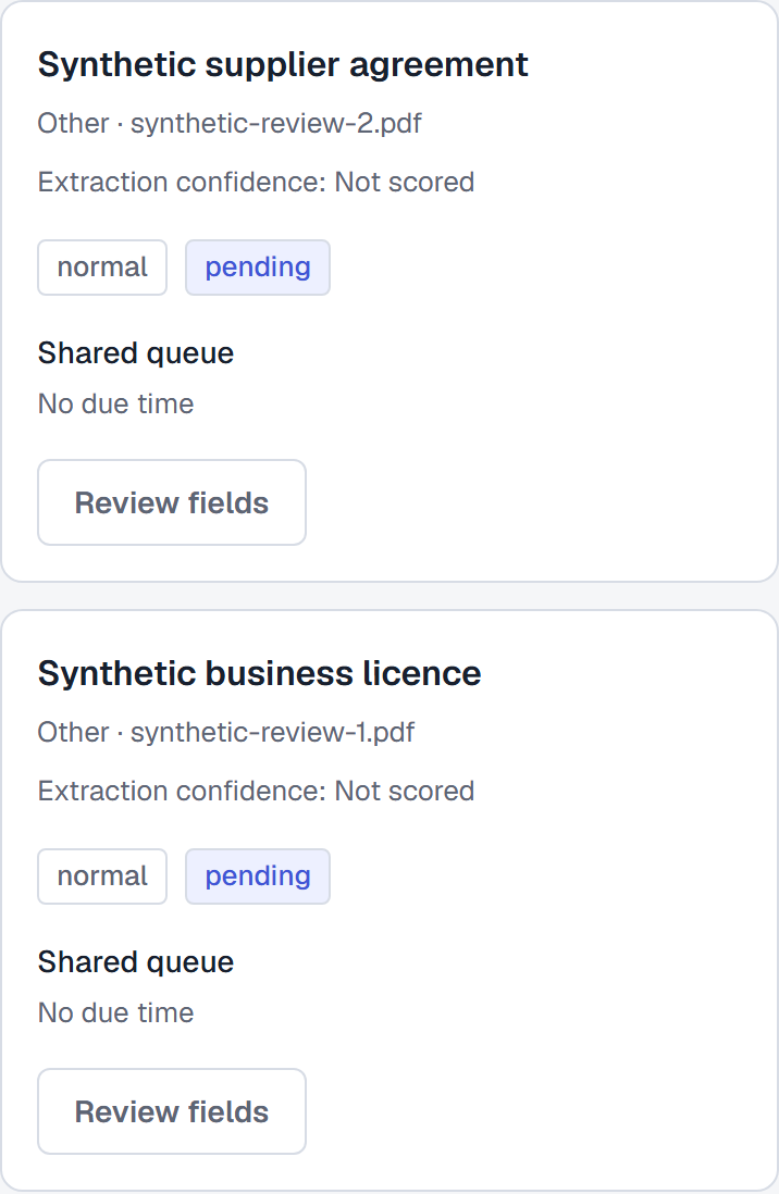 Two synthetic documents waiting for review, with source filenames, pending states and review actions
